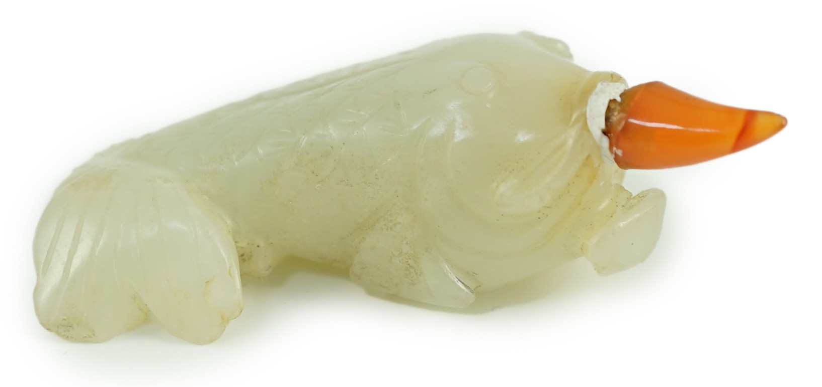 A Chinese pale celadon jade 'fish' snuff bottle, 19th century, 5.3cm long